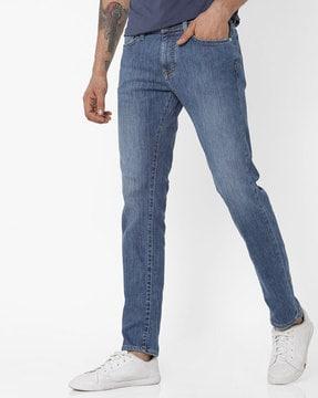 lightly washed skinny jeans