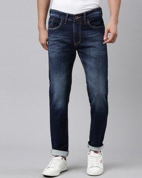 lightly-washed slim-fit jeans with 5 pocket styling