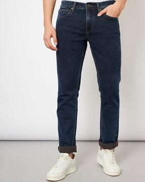 lightly-washed slim fit jeans with 5-pocket styling