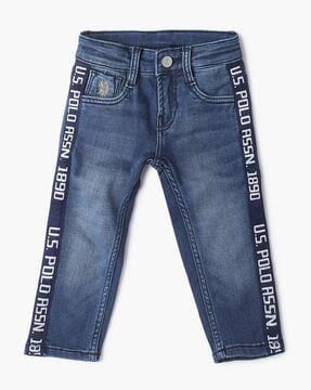 lightly washed slim fit jeans with brand taping