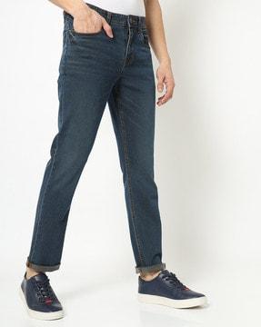 lightly washed slim fit jeans