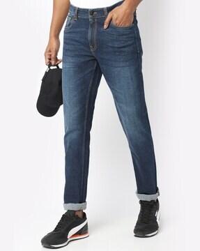 lightly washed slim fit jeans