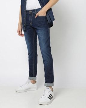 lightly washed slim fit jeans