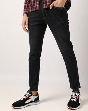 lightly washed slim fit jeans