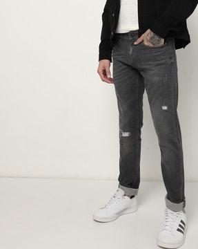 lightly washed slim fit jeans