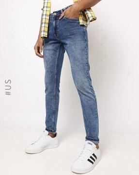 lightly washed slim fit jeans