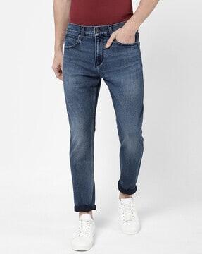 lightly washed slim fit jeans