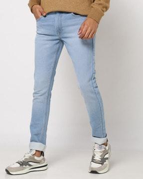 lightly washed slim fit jeans