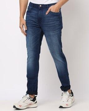 lightly washed slim fit jeans