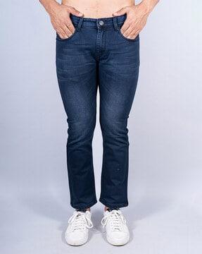 lightly-washed slim-fit jeans