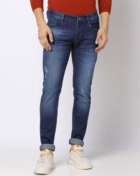 lightly washed slim fit jeans