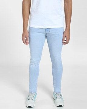 lightly-washed slim fit jeans