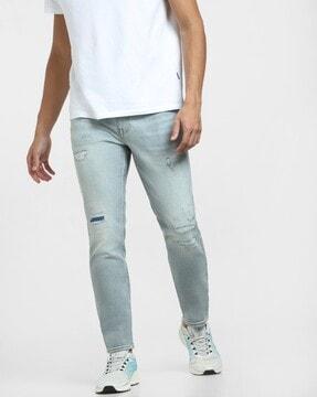 lightly washed slim fit jeans