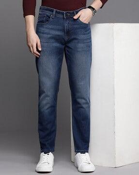 lightly washed slim fit jeans