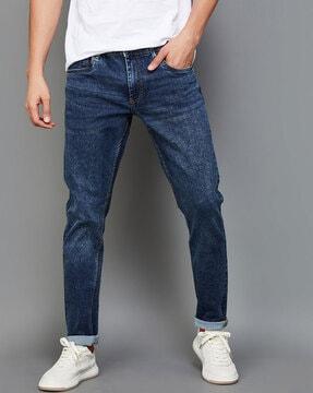 lightly washed slim fit jeans