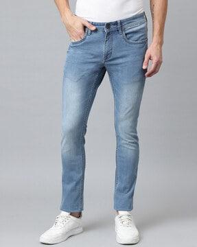 lightly-washed slim jeans