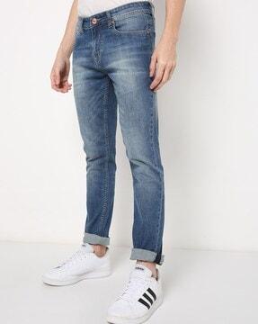 lightly washed slim jeans