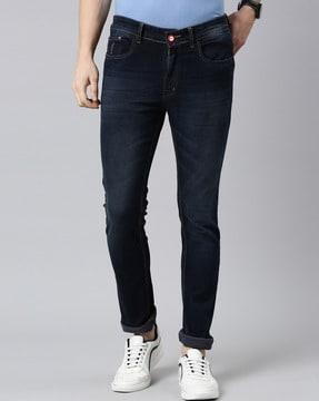 lightly washed slim jeans