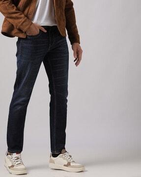 lightly washed slim tapered fit jeans