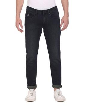 lightly washed slim tapered fit jeans