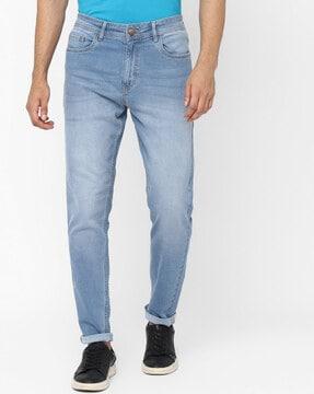 lightly washed tapered fit jeans