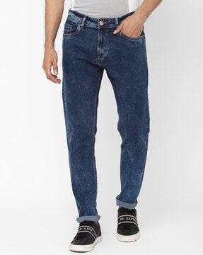 lightly washed tapered fit jeans