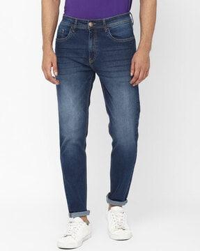 lightly washed tapered fit jeans