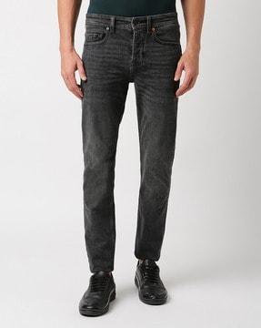 lightly washed tapered fit jeans