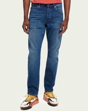 lightly washed tapered fit jeans