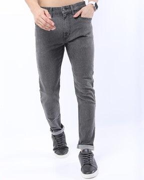 lightly washed tapered fit jeans