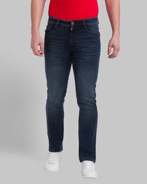 lightly washed tapered fit jeans