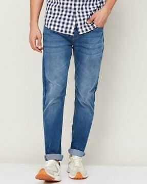 lightly washed tapered fit jeans