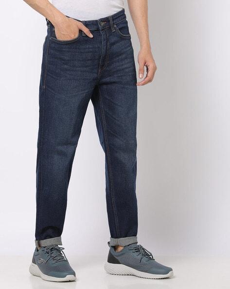 lightly washed tapered jeans
