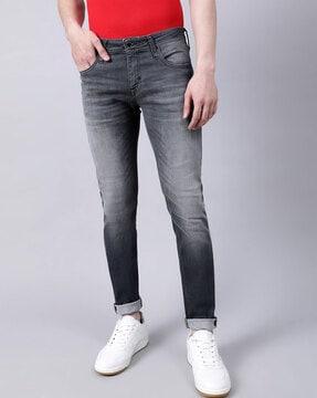 lightly washed tapered jeans