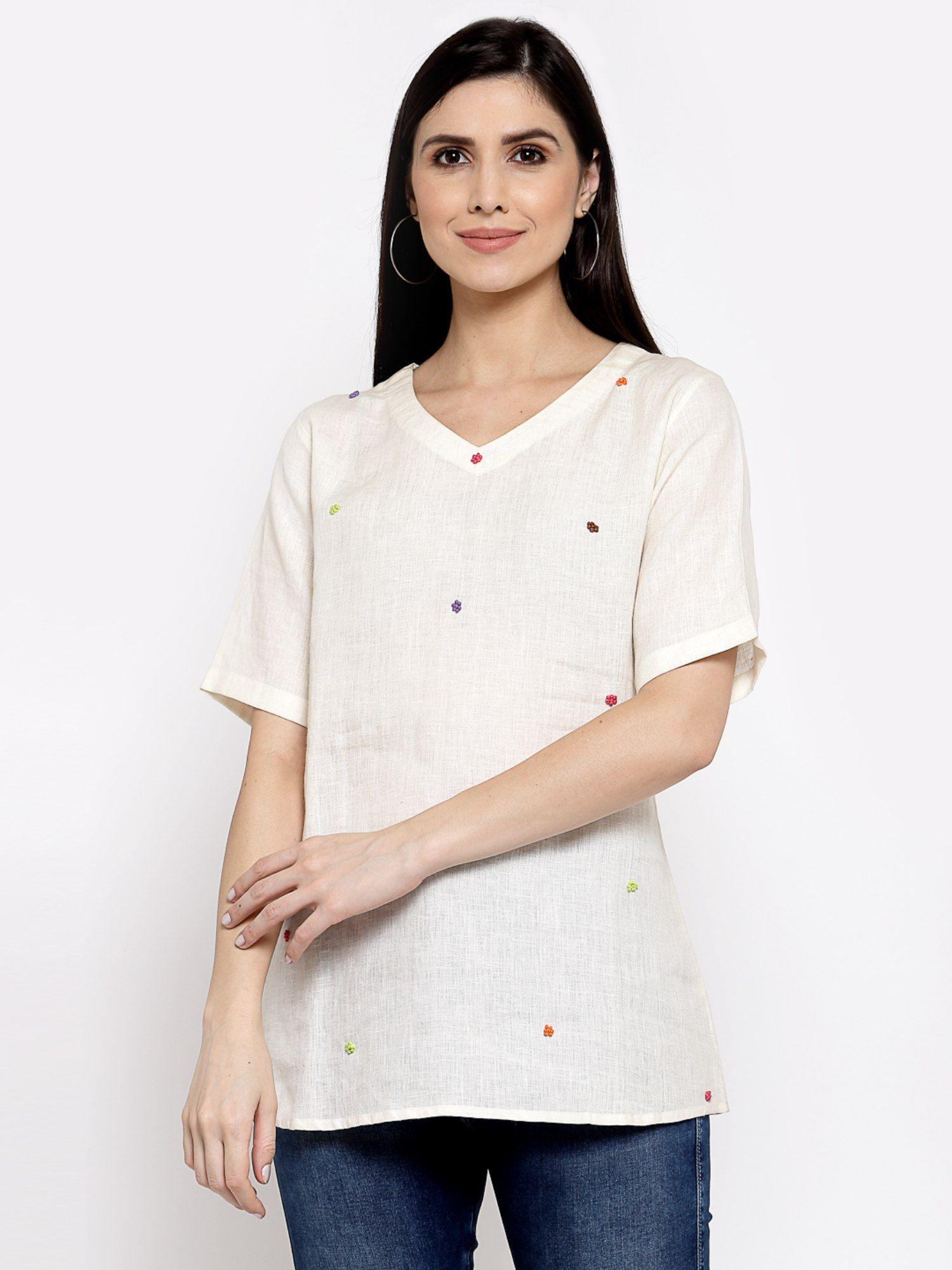 linen top with hand embroidery on it -white