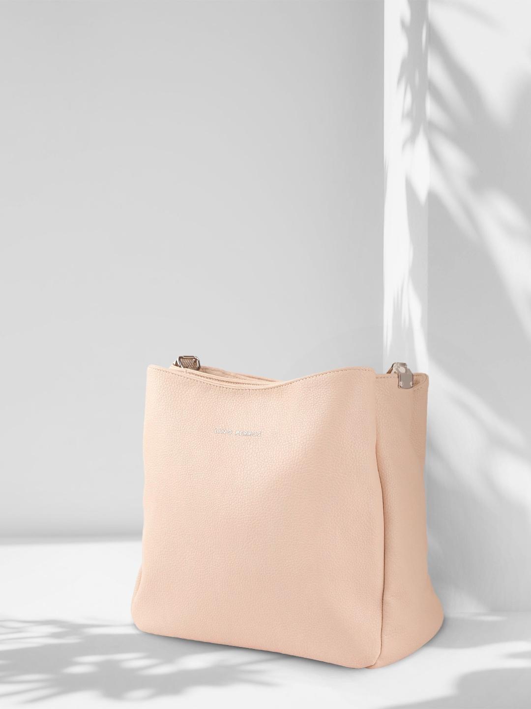 lino perros peach-coloured solid hobo bag