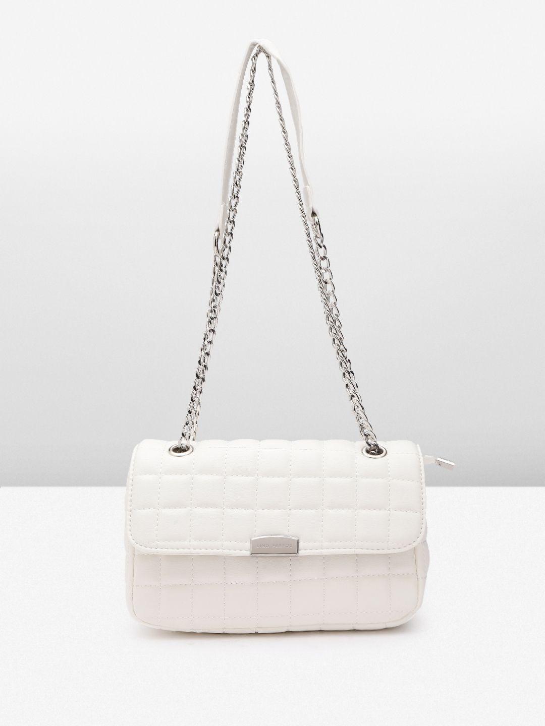 lino perros structured sling bag with quilted detail