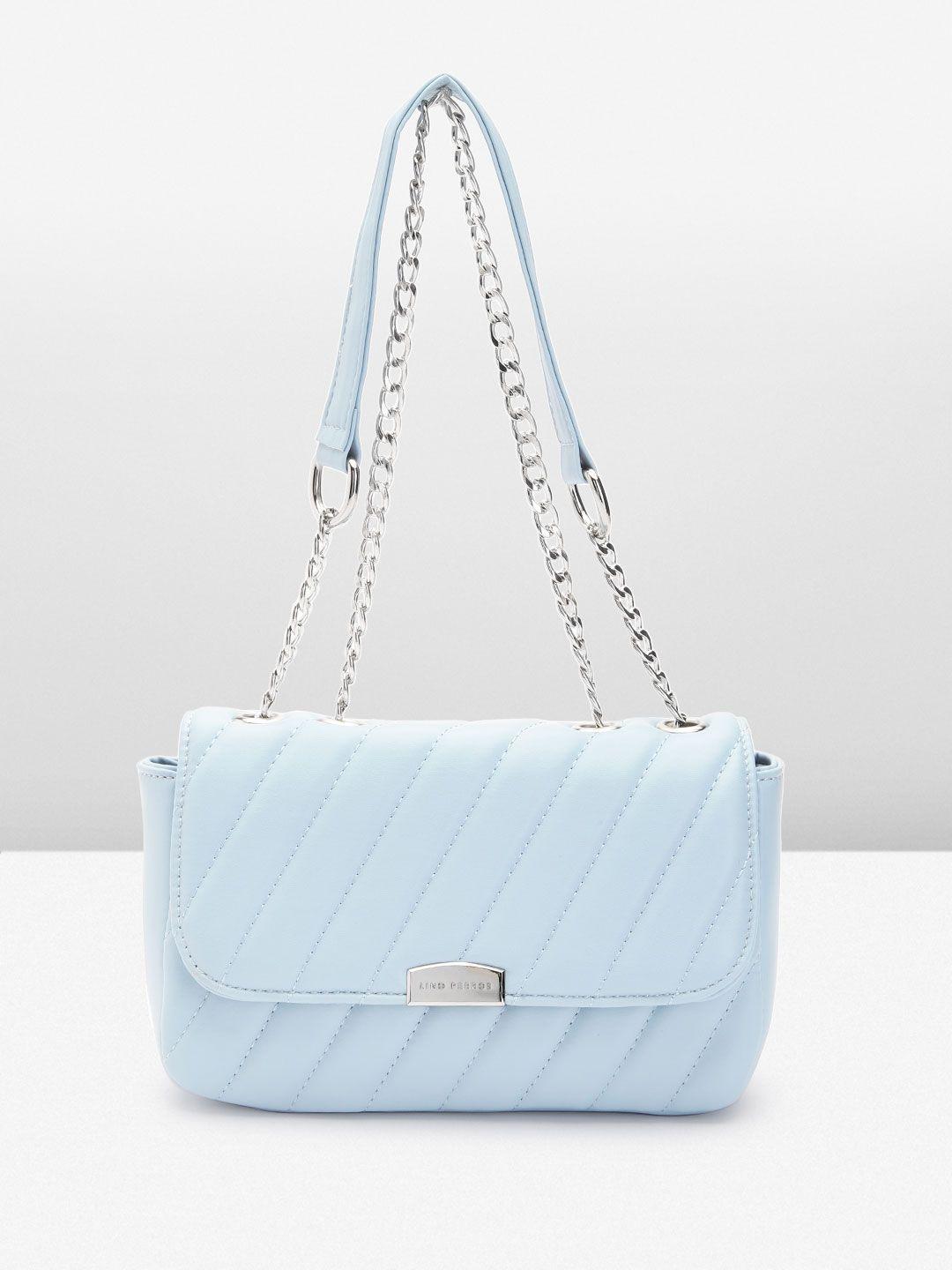 lino perros structured sling bag with quilted detail