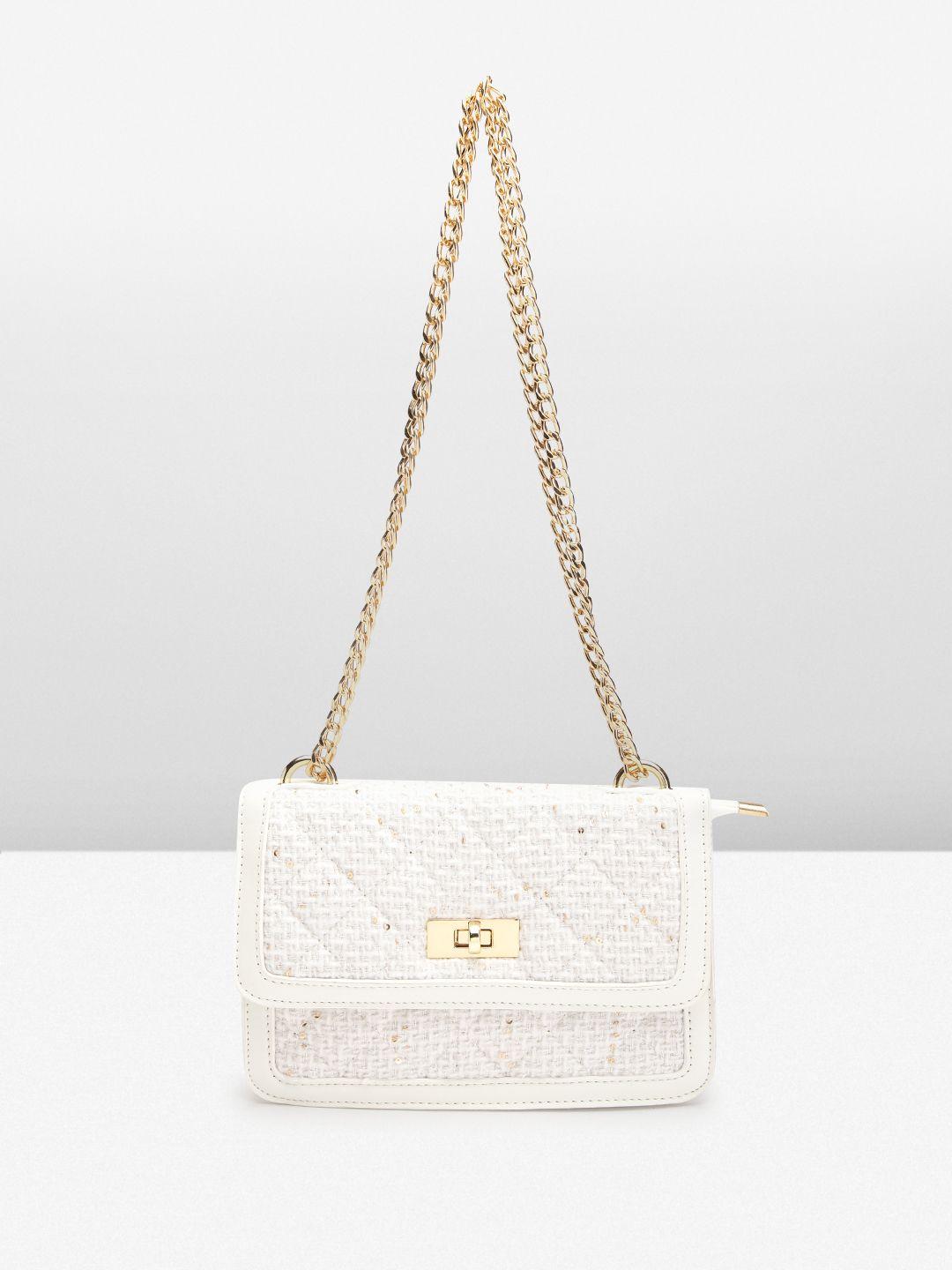 lino perros structured sling bag with quilted detail