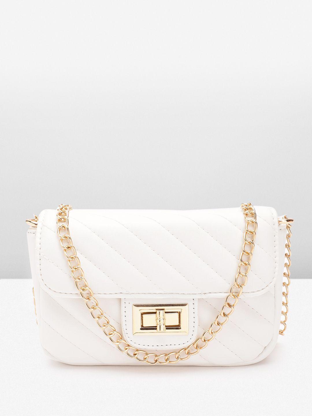 lino perros structured sling bag with quilted detail