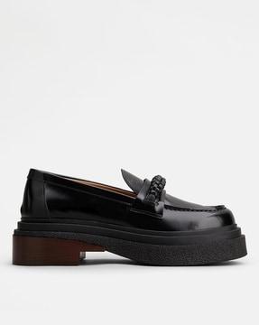loafers in leather with weaving