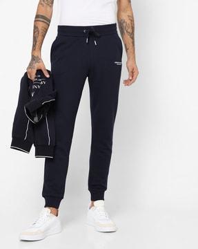 logo print flat-front trousers