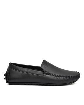 logo embossed slip-on shoes