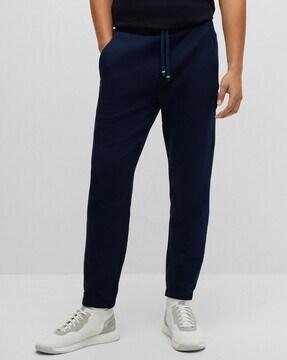 logo embroidered cotton blend track pants