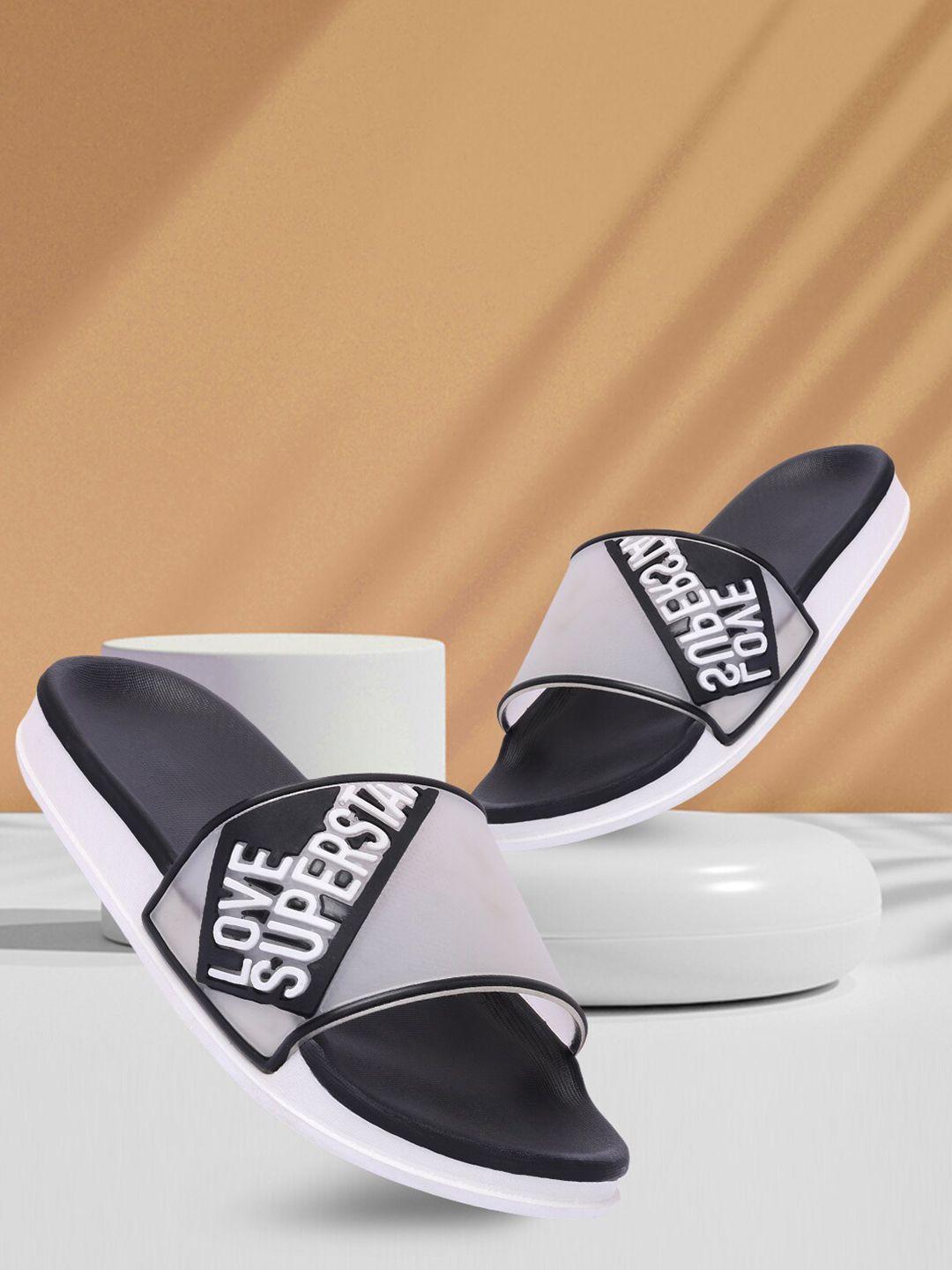 longwalk women black & white rubber sliders