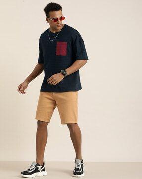 loose fit crew-neck t-shirt with patch pocket