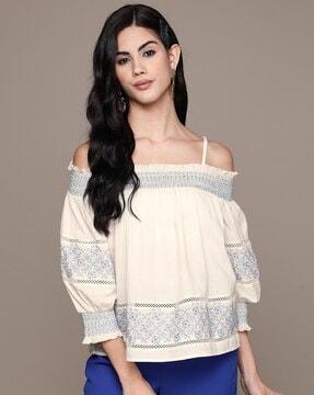 loose fit strappy top with embroidery