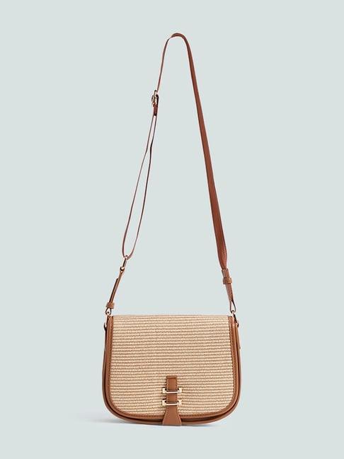 lov by westside solid beige saddle bag