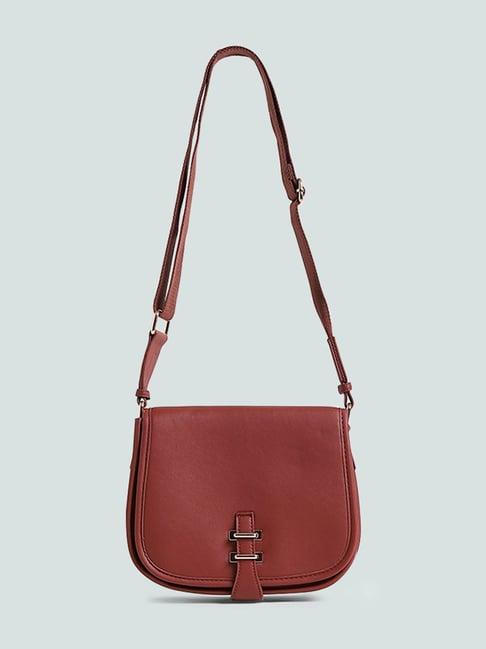 lov by westside solid rust-colored saddle bag