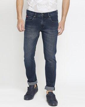 low-rise lightly washed slim fit jeans